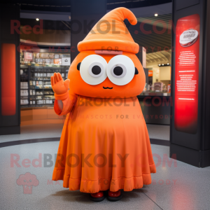 Orange Cyclops mascot costume character dressed with a Maxi Skirt and Berets