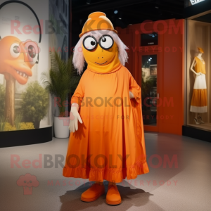 Orange Cyclops mascot costume character dressed with a Maxi Skirt and Berets