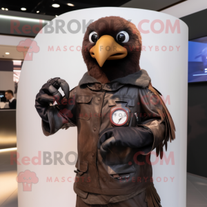 Brown Crow mascot costume character dressed with a Leather Jacket and Smartwatches