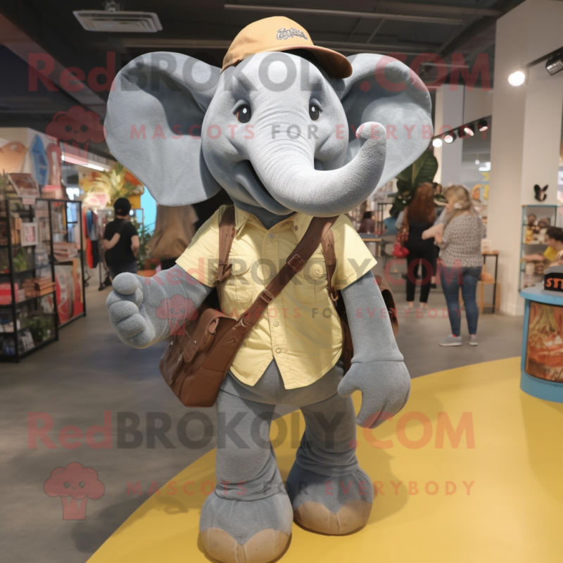 Gray Elephant mascot costume character dressed with a Mom Jeans and Messenger bags