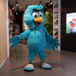 Turquoise Eagle mascot costume character dressed with a Joggers and Cufflinks