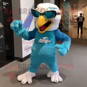 Turquoise Eagle mascot costume character dressed with a Joggers and Cufflinks