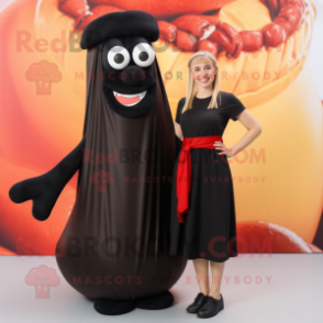 Black Currywurst mascot costume character dressed with a Maxi Skirt and Shoe laces