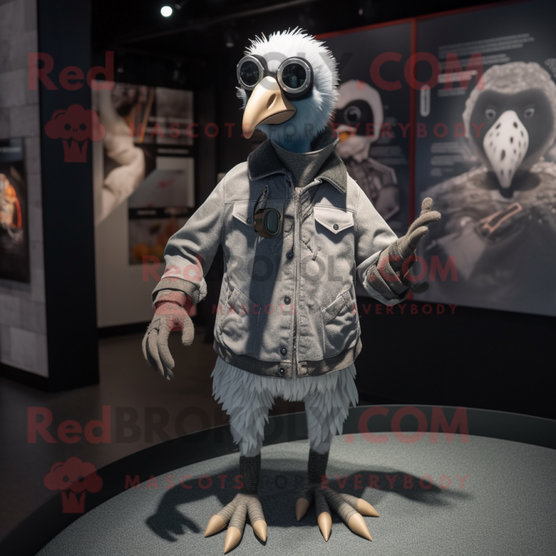 Gray Guinea Fowl mascot costume character dressed with a Moto Jacket and Shoe laces