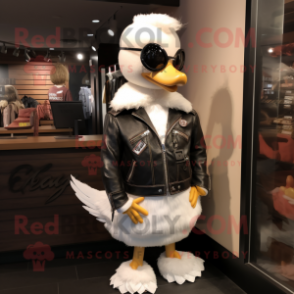 nan Swans mascot costume character dressed with a Leather Jacket and Brooches