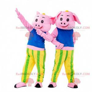 2 mascotes cor de rosa, fantasias de porco coloridas -