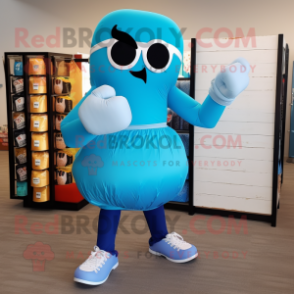 Sky Blue Boxing Glove mascot costume character dressed with a A-Line Skirt and Sunglasses