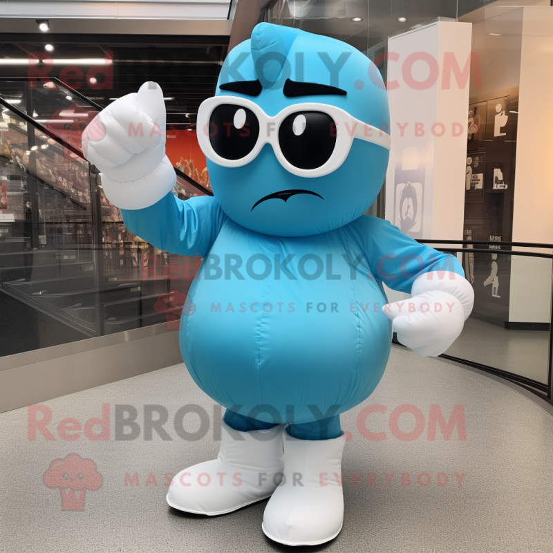 Sky Blue Boxing Glove mascot costume character dressed with a A-Line Skirt and Sunglasses