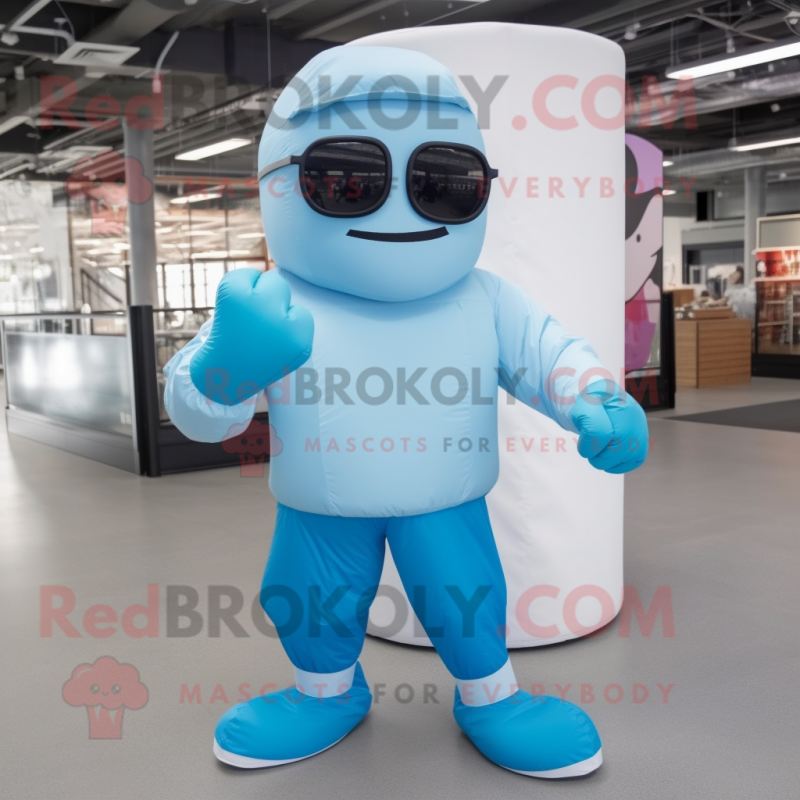 Sky Blue Boxing Glove mascot costume character dressed with a A-Line Skirt and Sunglasses