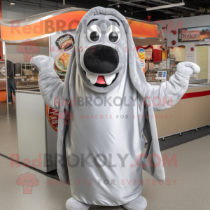 Silver Hot Dogs mascot costume character dressed with a Cover-up and Suspenders