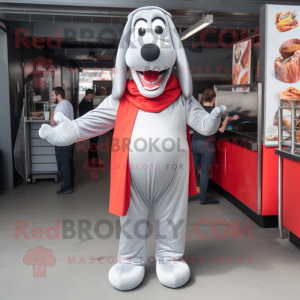 Silver Hot Dogs mascot costume character dressed with a Cover-up and Suspenders