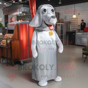 Silver Hot Dogs mascot costume character dressed with a Cover-up and Suspenders