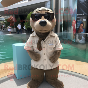 Olive Sea Lion mascot costume character dressed with a Poplin Shirt and Eyeglasses