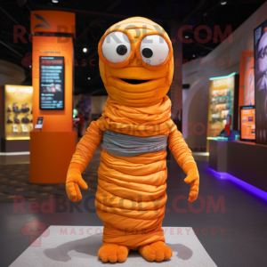 Orange Mummy mascot costume character dressed with a Sweatshirt and Necklaces