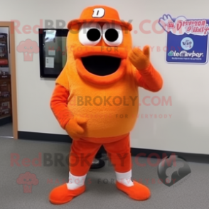 Orange Wrist Watch mascot costume character dressed with a Corduroy Pants and Foot pads