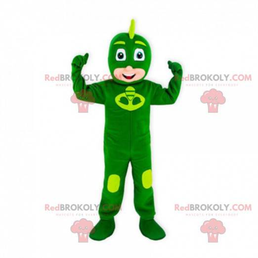 Mascota niño con una combinación verde de superhéroes. -