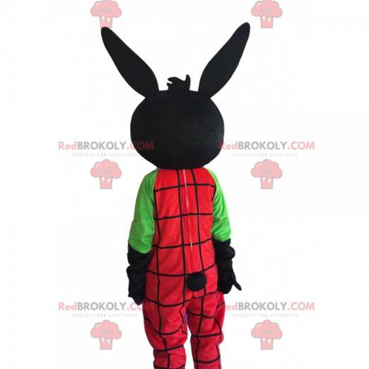 Mascotte de lapin noir avec une salopette rouge, costume doudou