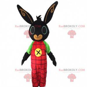 Black rabbit mascot with red overalls, plush costume -