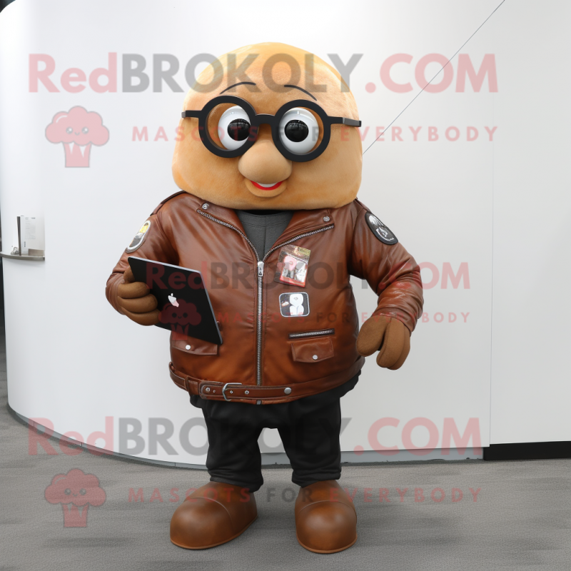 Rust Potato mascot costume character dressed with a Moto Jacket and Reading glasses