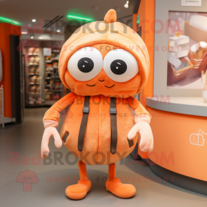 Peach Spider mascot costume character dressed with a Coat and Beanies