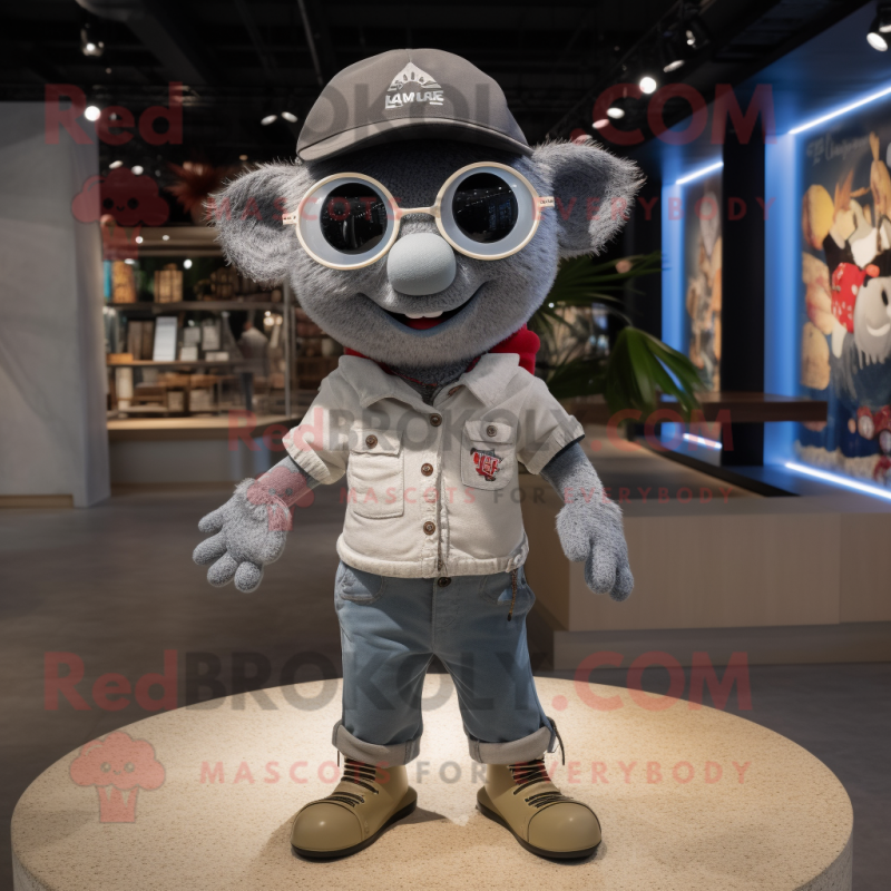 Gray Ceviche mascot costume character dressed with a Henley Shirt and Keychains