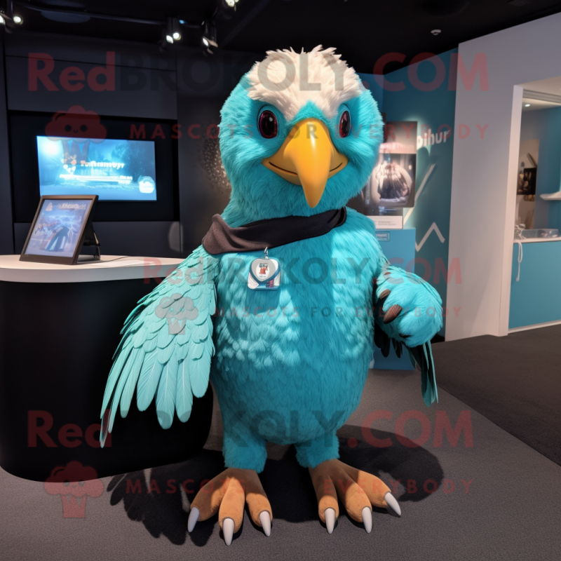 Cyan Eagle mascot costume character dressed with a Playsuit and Wraps Cyan Eagle mascot costume character dressed with a Playsuit and Wraps