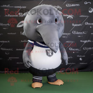 Gray Humpback Whale mascot costume character dressed with a Rugby Shirt and Hairpins