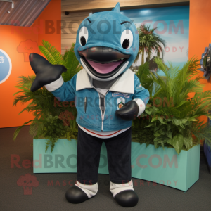 Turquoise Killer Whale mascot costume character dressed with a Denim Shorts and Ties