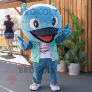 Turquoise Killer Whale mascot costume character dressed with a Denim Shorts and Ties