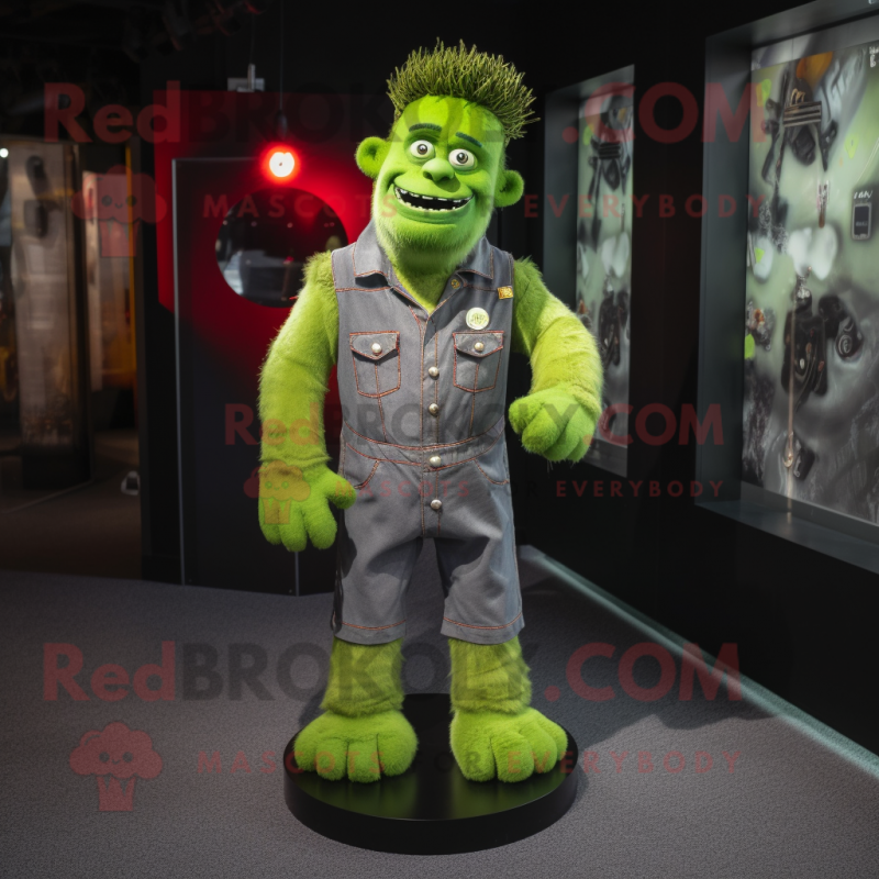 Lime Green Frankenstein'S Monster mascot costume character dressed with a Dungarees and Lapel pins