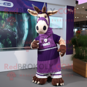 Purple Okapi mascot costume character dressed with a Skirt and Beanies