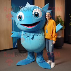 Turquoise Tuna mascot costume character dressed with a Mom Jeans and Wraps