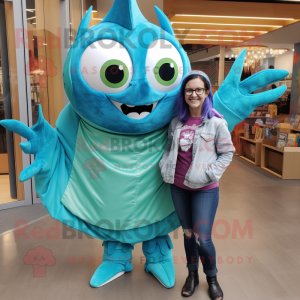 Turquoise Tuna mascot costume character dressed with a Mom Jeans and Wraps