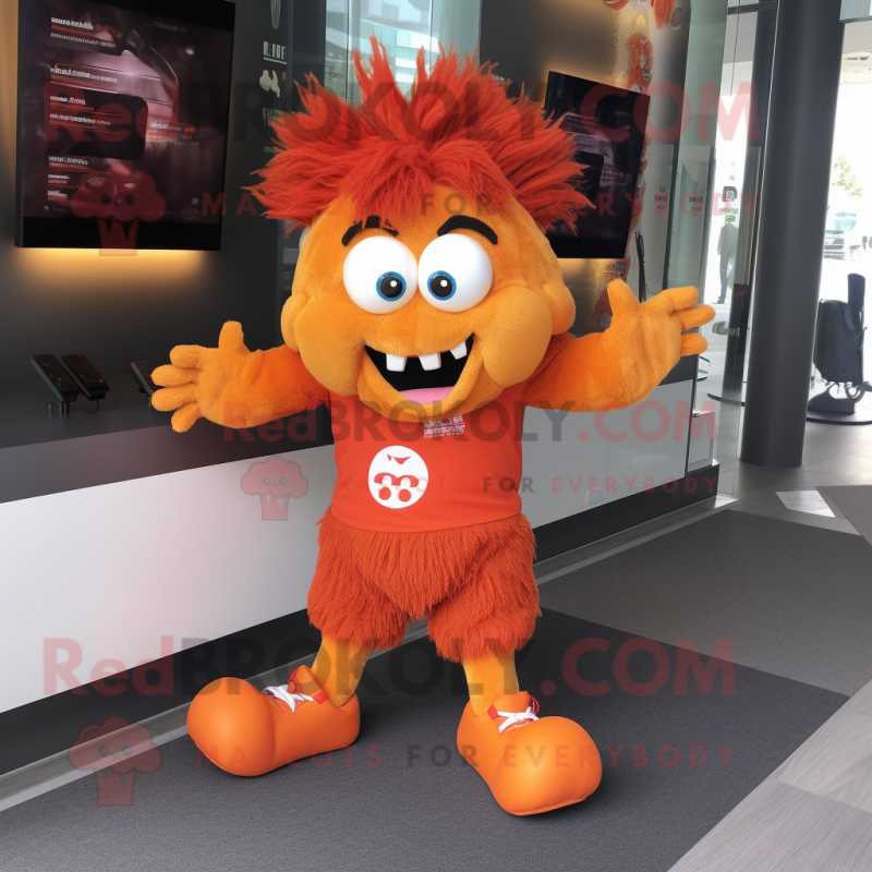 Orange Demon mascot costume character dressed with a Running Shorts and Hair clips