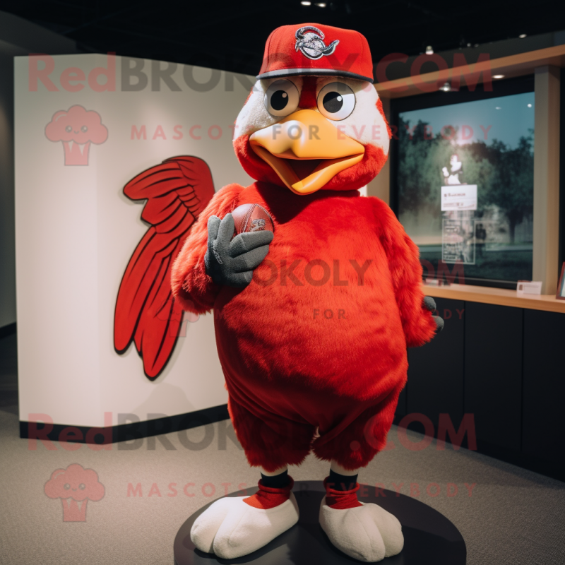 Red Pigeon mascot costume character dressed with a Baseball Tee and Lapel pins