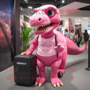 Pink Tyrannosaurus mascot costume character dressed with a Graphic Tee and Messenger bags