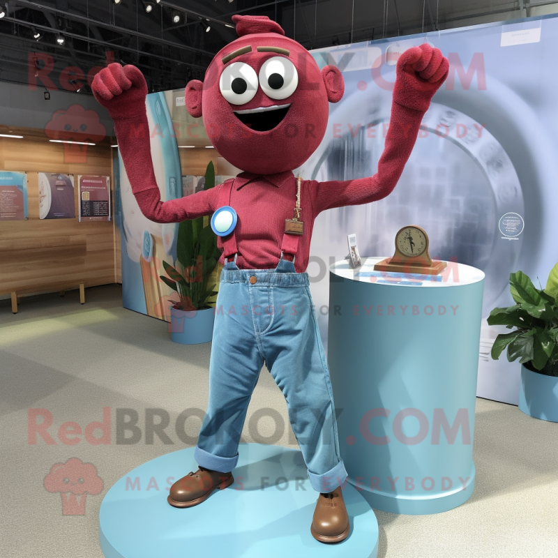 Maroon Contortionist mascot costume character dressed with a Chambray Shirt and Brooches Maroon Contortionist mascot costume character dressed with a Chambray Shirt and Brooches