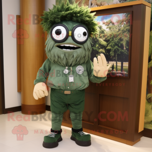 Forest Green Cyclops mascot costume character dressed with a Cargo Shorts and Tie pins