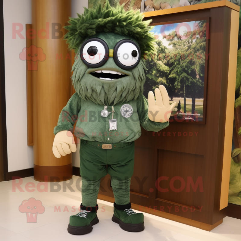 Forest Green Cyclops mascot costume character dressed with a Cargo Shorts and Tie pins