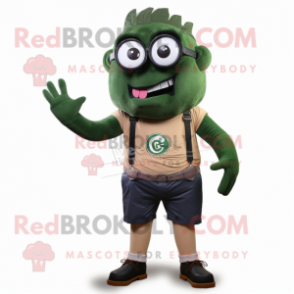 Forest Green Cyclops mascot costume character dressed with a Cargo Shorts and Tie pins