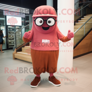 Rust Pink mascot costume character dressed with a Graphic Tee and Eyeglasses