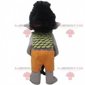 Gray troll mascot with black hair and orange shorts -