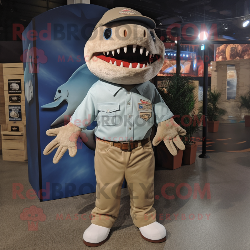 Tan Shark mascot costume character dressed with a Button-Up Shirt and Foot pads