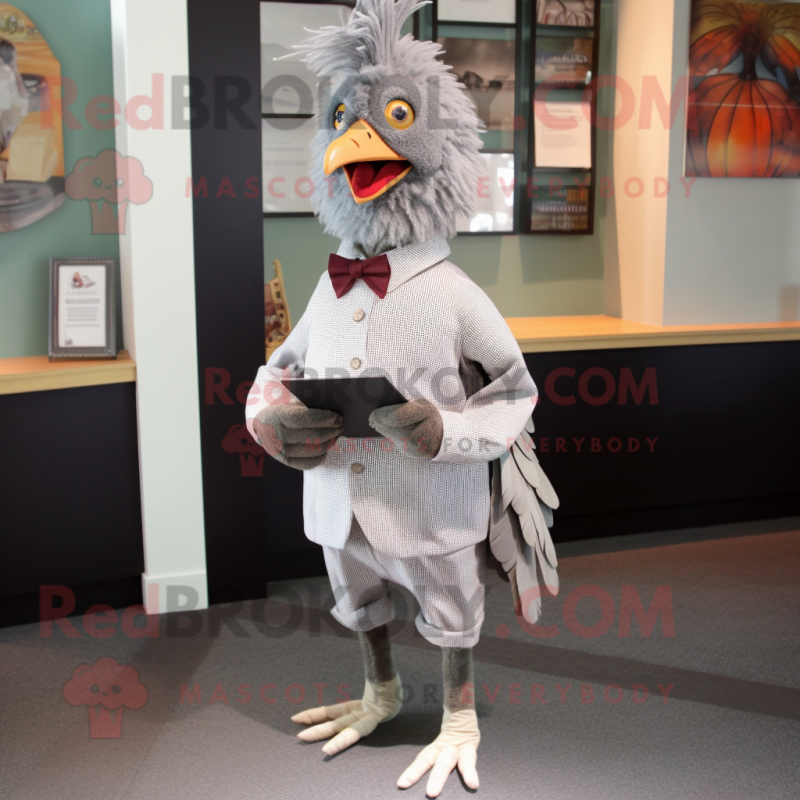 Gray Hens mascot costume character dressed with a Bermuda Shorts and Pocket squares