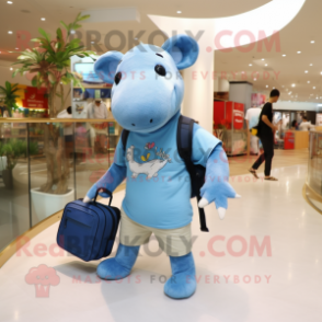 Sky Blue Tapir mascot costume character dressed with a Denim Shorts and Tote bags