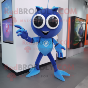 Blue Spider mascot costume character dressed with a Flare Jeans and Smartwatches