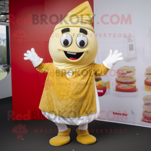 Gold Shakshuka mascot costume character dressed with a Poplin Shirt and Mittens