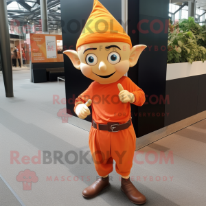 Orange Elf mascot costume character dressed with a Long Sleeve Tee and Pocket squares
