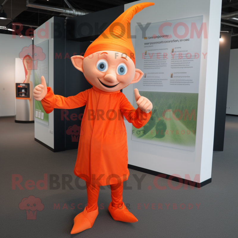 Orange Elf mascot costume character dressed with a Long Sleeve Tee and Pocket squares Orange Elf mascot costume character dressed with a Long Sleeve Tee and Pocket squares