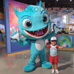 Turquoise Shark mascot costume character dressed with a Romper and Watches